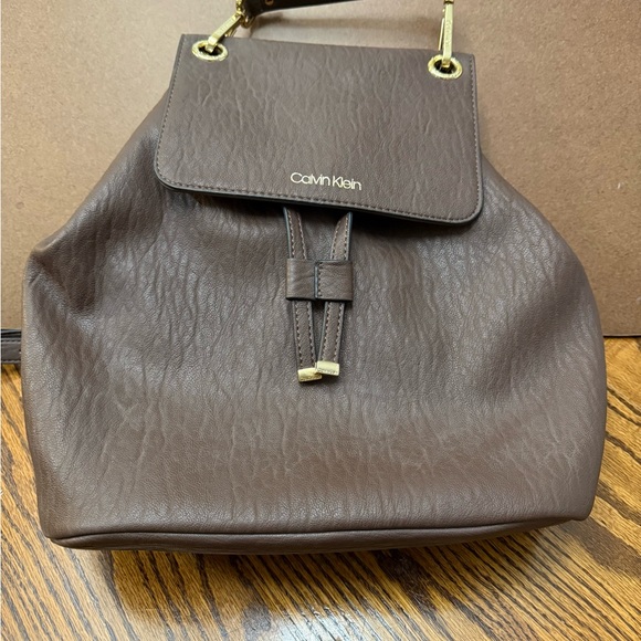 Calvin Klein Handbags - Calvin Klein Brown Faux Leather Backpack NWOT